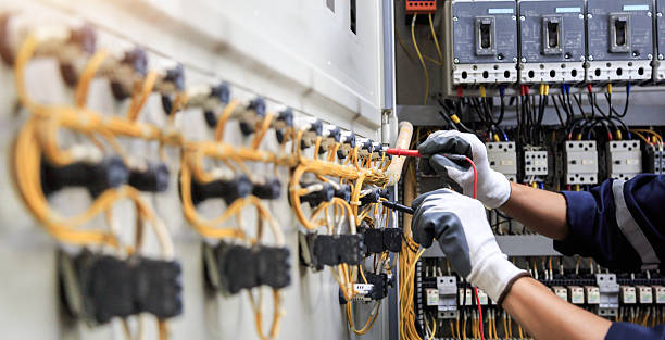 Professional Electrician technician working in University Park, TX